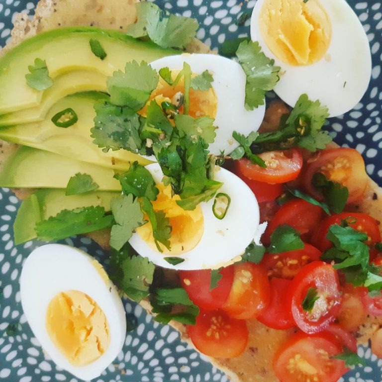 boiled egg avocado and tomatoes on toast 768x768